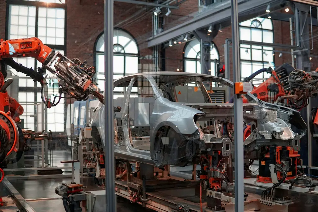 An automated vehicle production line with industrial robots